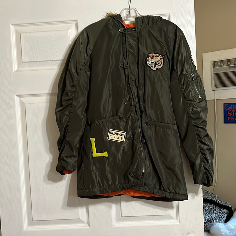 Puffy green jacket